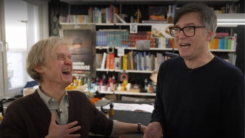 Pierre M. Krause und Ralph Caspers in Caspers' Büro