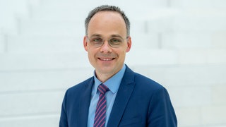 Dr. Denis Alt