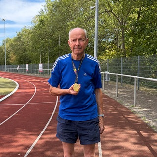 Goldmedaille mit 80
