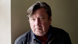 Der finnische Filmregisseur Aki Kaurismäki im Büro der Filmproduktionsfirma Sputnik in Helsinki, Finnland. Archivfoto.