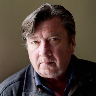 Der finnische Filmregisseur Aki Kaurismäki im Büro der Filmproduktionsfirma Sputnik in Helsinki, Finnland. Archivfoto.