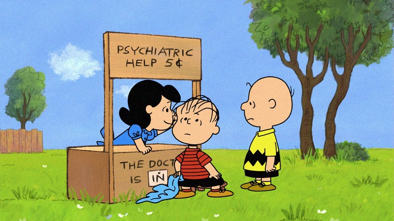 Die Peanuts (Szene aus Video): Lucy, Linus und Charlie Brown (vlnr)