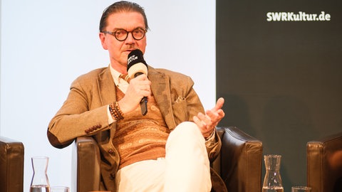 Der Autor Eckhart Nickel auf der Jubiläumsfeier "50 Jahre SWR Bestenliste" im Literaturhaus Stuttgart