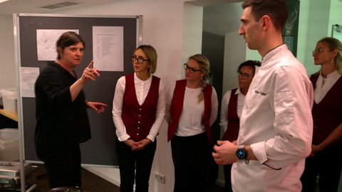 Besprechung eines Catering-Teams