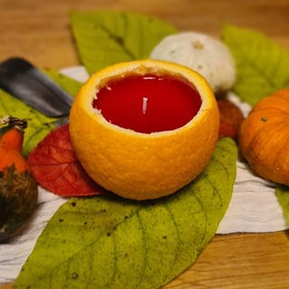 Orangenkerze