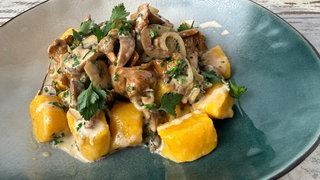 Kürbis-Gnocchi mit Pilzrahmsoße	