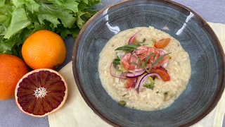 Risotto mit Blutorange, Endivie und Lachs-Tatar 