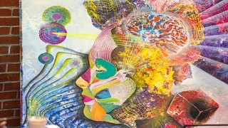 Ein Kunstwerk zum Thema Gehirn und Wahrnehmung Neurodivergenz beim Zukunftstag Mittelstand in Berlin.
