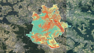 Im KI-basierten Modell sind die versiegelten Flächen von Stuttgart rot markiert.  Quelle: KIT-IPF & ci-Tec GmbH  Luftbild: LGL