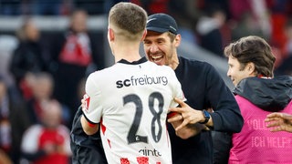 Matthias Ginter und Trainer Julian Schuster feierten Ginters 400. Bundesliga-Spiel mit einem Sieg des SC Freiburg gegen Werder Bremen.