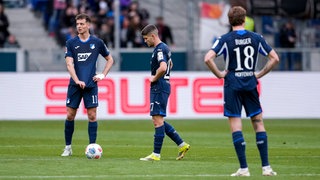 Die Hoffenheimer Fisnik Asllani, Andrej Kramaric und Wouter Burger müssen sich trotz der vielen Chancen mit einer Niederlage gegen den FC St. Pauli abfinden.