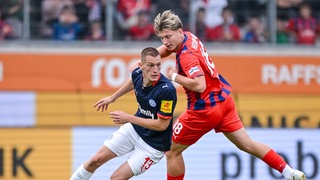 Ivan Nekic (li, Holstein Kiel) in Aktion gegen Alessandro Vogt (1. FC Heidenheim 1846)