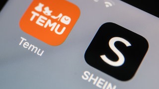 Temu und Shein Appsymbole auf einem Smartphonedisplay.