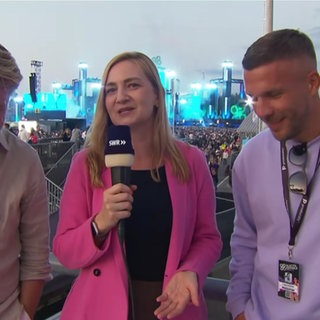 Reporterin Laura Uzupyte und Veranstalter