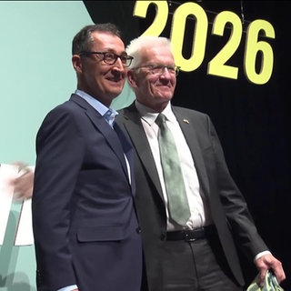 Özdemir und Kretschmann gemeinsam auf einer Bühne