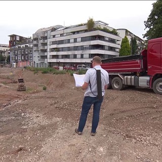 Auf der Baustelle in der Tübinger Südstadt: Hier bauen mehrere Unternehmer aus der Region gemeinsam Wohnungen für Mitarbeitende. Comeback der Werkswohnungen. 