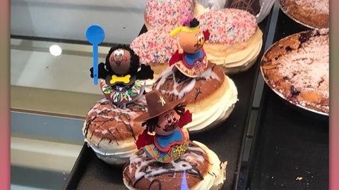 Faschings-Berliner einer Bäckerei in Heilbronn. Dekorationsmaterial zeigte auch Darstellungen Schwarzer und indigener Menschen