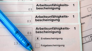 SymbolbildEine Arbeitsunfähigkeitsbescheinigung