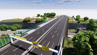 Der achtspurige Neubau der B10-Brücke von oben betrachtet. Eine Betonbrücke mit einer gläsernen Lärmschutzwand führt über einen Fluss.