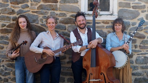 Die amerikanische Band The Shooflies macht Country- und Folk-Musik mit Pfälzer Dialekt.