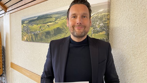Staatssekretär Daniel Stich beim Besuch im Gemeindehaus in Osann. 