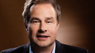 Moderator Lars Reichow