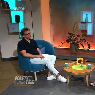 SWR-Kollege Karsten Umlauf und Moderatorin Evelin König