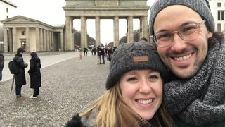 Donnie Ashburn und seine Frau vor dem Brandenburger Tor