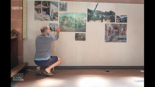 Fotograf Frank Schultze auf einer Fotoausstellung